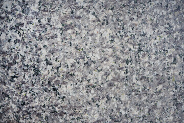 Background and Texture of polished gray granite rock.