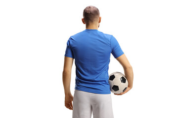 Rear view shot of a soccer player in a blue jersey and white shorts holding a ball © Ljupco Smokovski
