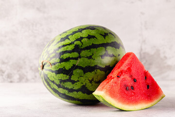 Fresh tasty delicious watermelon on a light background