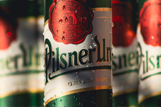 Prague, Czech Republic - March 13, 2022: Cans of Pilsner Urquell beers in the fridge. Pilsner Urquell is a Czech lager brewed by the Pilsner Urquell Brewery.