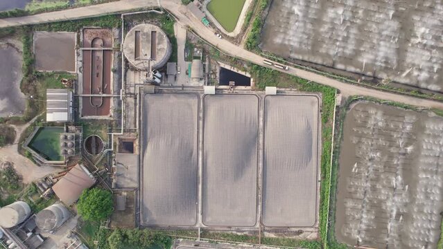 Ethanol fermentation pond with water spraying in wastewater pond at ethanal chemical manufacturing factory