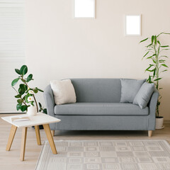 The interior of a modern living room in bright colors. Sofa with pillows, coffee table, ficus and bamboo in a pot, carved wooden wall with geometric pattern