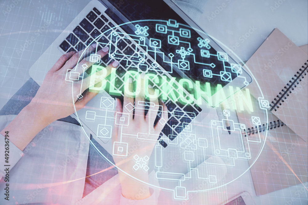 Poster Double exposure of woman hands working on computer and blockchain theme hologram drawing. Top View. bitcoin cryptocurrency concept.