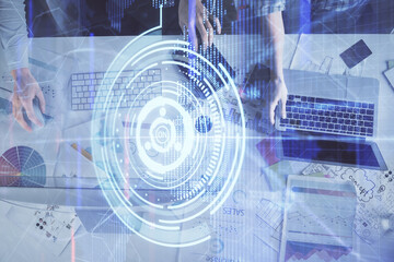 Double exposure of man and woman working together and technology theme drawing hologram. Big data concept. Computer background.