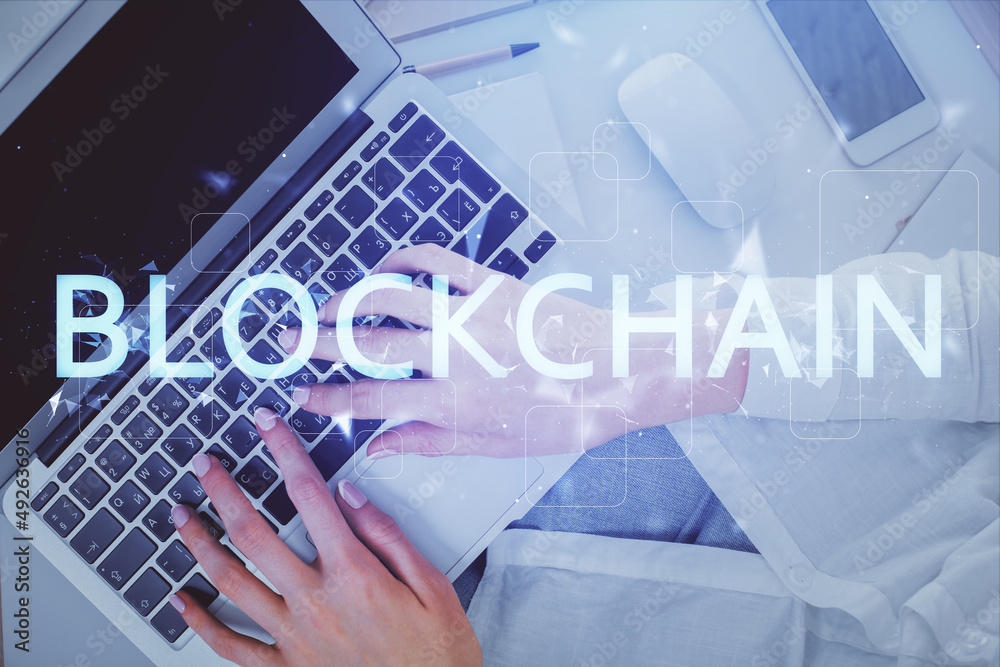 Poster Double exposure of woman hands working on computer and blockchain theme hologram drawing. Top View. bitcoin cryptocurrency concept.