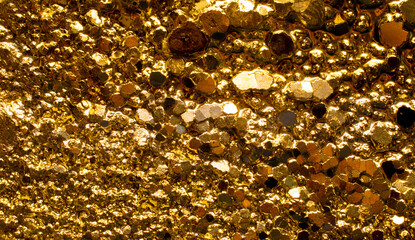 golden abstract crystalline background, play of lights