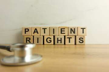 Patient rights text from wooden blocks with stethoscope