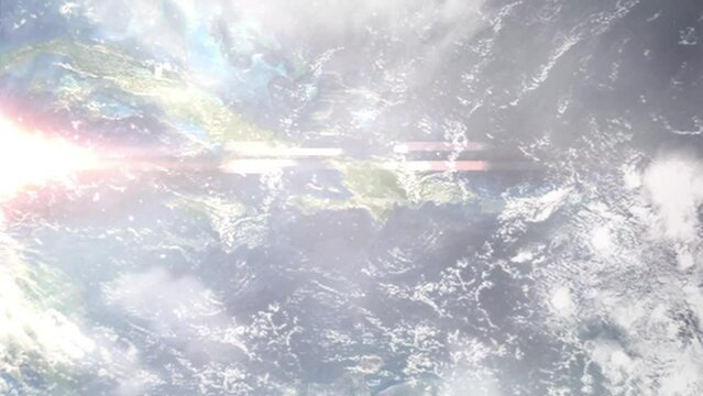 Earth zoom in from outer space to city. Zooming on Carrefour, Haiti. The animation continues by zoom out through clouds and atmosphere into space. Images from NASA