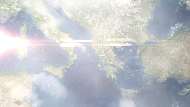 Earth zoom in from outer space to city. Zooming on Kerkyra, Greece. The animation continues by zoom out through clouds and atmosphere into space. Images from NASA