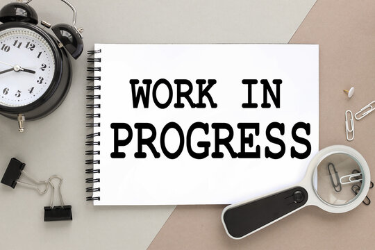 work in progress. the text is written on an open notebook