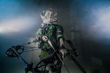 Fototapeta premium apocalypse fighters. a girl with a bow 