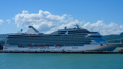 Fototapeta na wymiar Tourist liner at the pier in Dominican Republic. Close-up. High quality photo