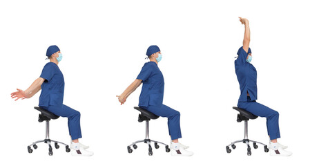 Professional medical male stretching arms, back,neck sitting on mobile saddle - profile view