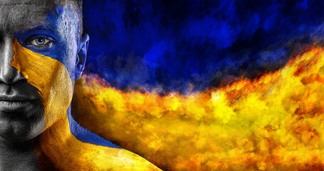 Flag of Ukraine painted on a face of soldier. War between Ukraine and Russia