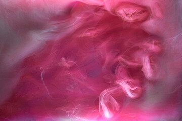 Pink smoke ink background, colorful fog, abstract swirling touch ocean sea, acrylic paint pigment underwater