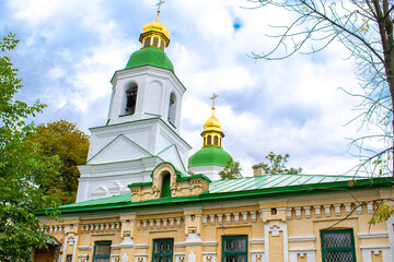 Scenic travel cityscape historic Pechersk Lavra Monastery church temple eastern orthodox Christian complex of caves with golden domes in Kiev,Ukraine.Old religion national architecture