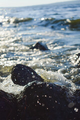 Waves on the sea. Sea water drops. Water splash. Sea foam