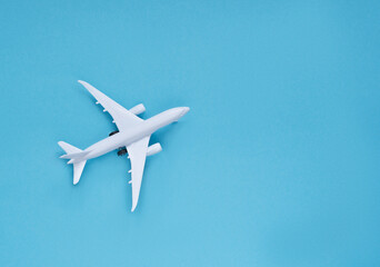 white airplane in the blue sky. air transportation.  travel planning. clean fuel. environmental protection concept