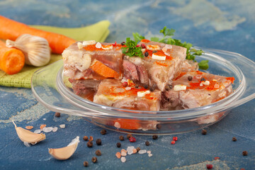 Pihtije - serbian traditional dish - aspic with pork meat and vegetables. Meat jelly - holodets,...