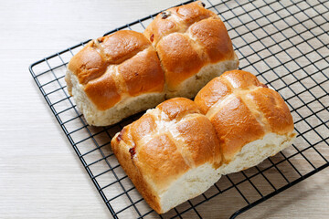 A homemade rolls on cooling rack.