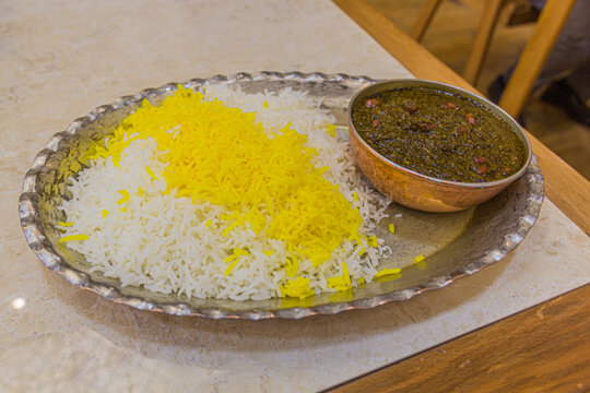 Food in Iran - Ghormeh Sabzi with saffron rice