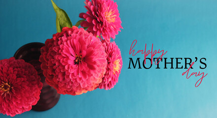 Zinnia flower bouquet for Mothers day holiday greeting with blue background. - 492655918