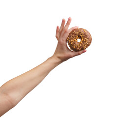a woman's hand holds a delicious doughnut. isolatedon white