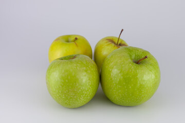 Fresh granny smith apples, isolated on white background.