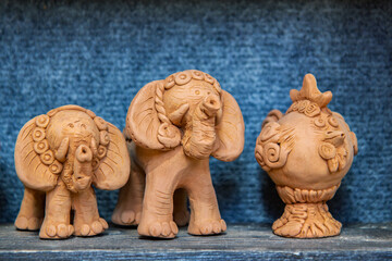 clay figures. pottery artisan workshop. elephants, bird