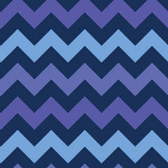 Chevron zigzag seamless pattern in very peri, light blue and purple over dark background. Great for textile, home décor and wallpaper 
