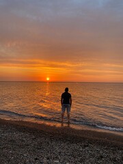 man watching the sunset