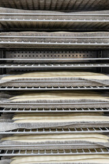 Gennevilliers, France - 03 11 2022: Artisan baker and pastry chef. Detail of bread proofing chamber in a bakery