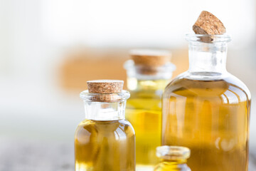 Assortment of organic essential oils. Natural moisturizing body and face treatment. Plant extract for healthy young skin. Relaxation, aromatherapy, salon spa. Close up, macro view