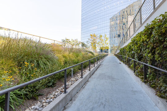 Accessible pathway with railing leading up to Cira Green Park in Philadelphia, Pennsylvania, USA