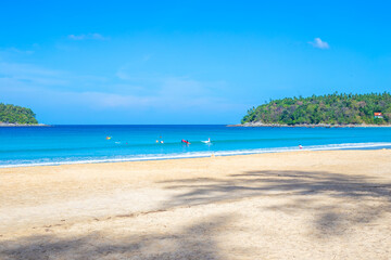 Sea tropical landscape. Blue sea and blue sky and white sand. Idyllic vacation on the sea coast. Travel and tourism
