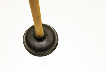 Vantus with a wooden handle lies on a white background