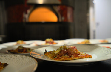 Pizza Flatbread in front of Oven