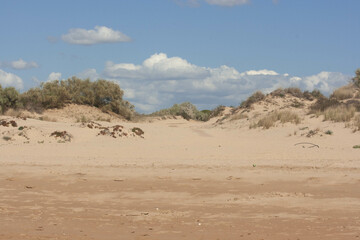 beach day with white sands and blue sea in huelva spain