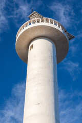 The Loreto lighthouse against a blue sky.