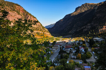 Early morning view of Ouray village surrounded by the rugged and rocky San Juan Mountains,...