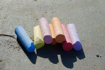 stack of sidewalk chalk in assortment of colors