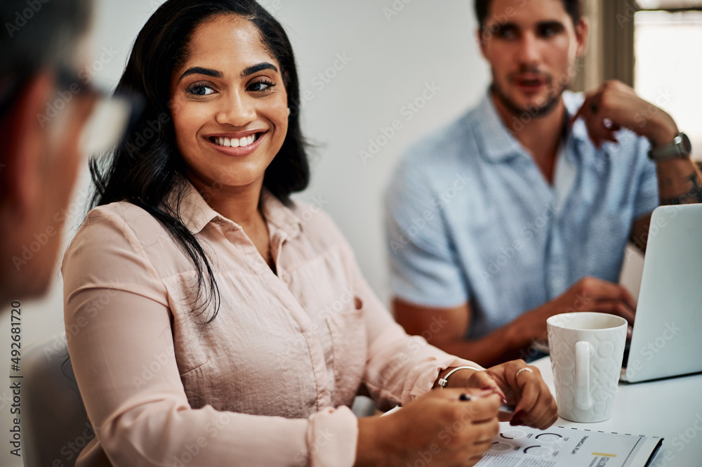 Canvas Prints Positivity leads to productivity. Shot of a group of businesspeople having a meeting in a modern office.