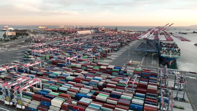 Aerial view of shipping containers and cargo ready for export and import from sea port