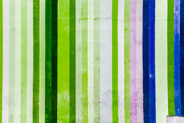 Grunge concrete wall with colorful stripes