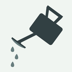 A watering can with water for watering. Minimalist watering can
