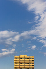 Top of building with dramatic sky in the background