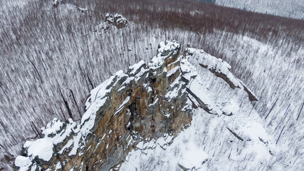 rocks in winter on the Anyui river. the rocks above the river. mansky pillars 