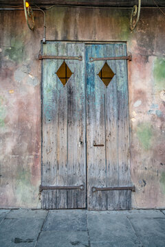 The beautiful pastel door of the famous Preservation Hall jazz venue in the French Quarter, in New Orleans, LA.