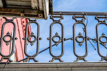 Beautiful, decorative iron fence on the balcony of a home in the French Quarter.