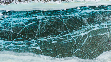 blue ice on the river . frozen river